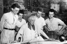 In a Aug. 17, 1938 file photo, architect Frank Lloyd Wright, center, is surrounded by four apprentices who work and study under his direction at Taliesin, his estate at Spring Green, Wis. The students are, from left, Eugene Masselink, Edgar Tafel, Jack Ho<br />AP 