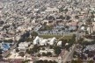 Porto Príncipe, Haiti, 2011. Vista aérea da região central da capital haitiana. O Palácio do Governo e a Catedral Católica ainda cercados por assentamentos provisórios, mesmo um ano após o terremoto<br />Foto Alyson Montrezol 
